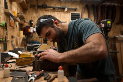 Josh working on a sea chest puzzle box